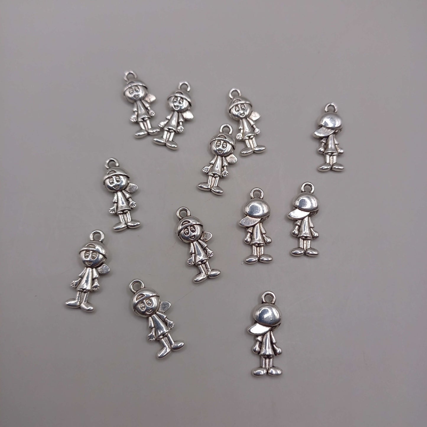(JW): Charms ανθρωπάκια